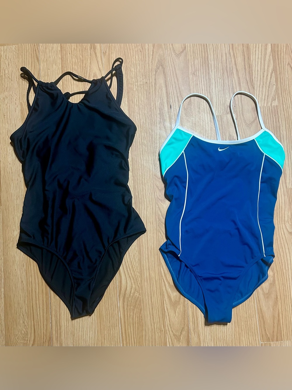 (2) one piece swimsuits ladies Size 12 NIKE & VENUS